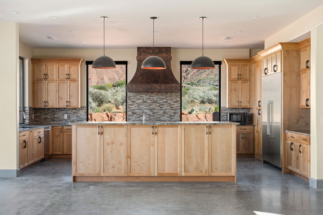 The Cliffs at Entrada Kitchen with large hood over stove view
